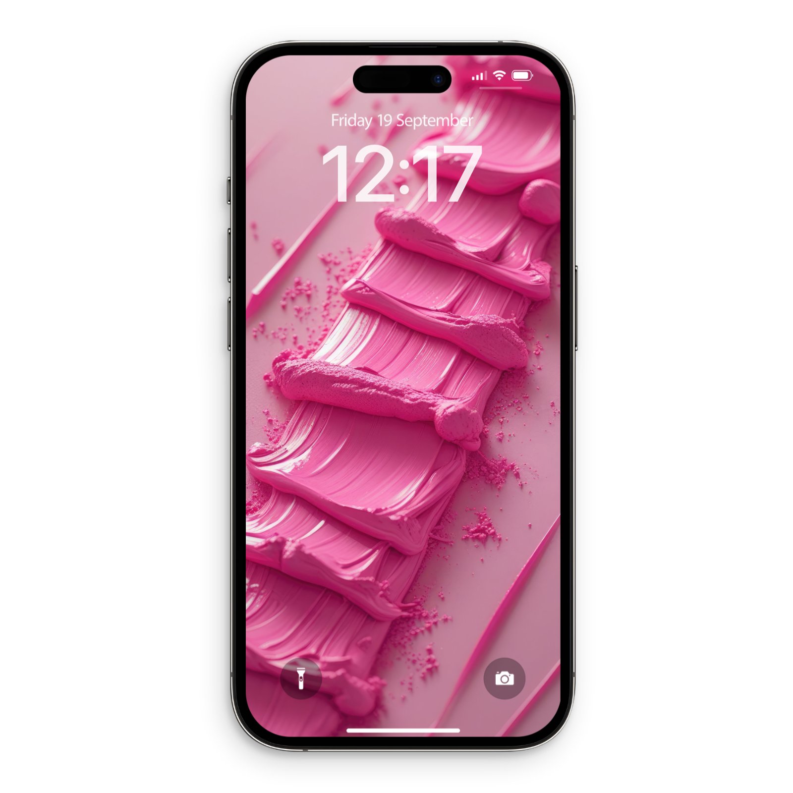 A black iPhone displaying a pink wallpaper with thick, vertical impasto paint strokes in bubblegum pink, scattered with powdered pigment specks on a dusty rose background. The lock screen shows the date "Friday 19 September" and time "12:17" in white.