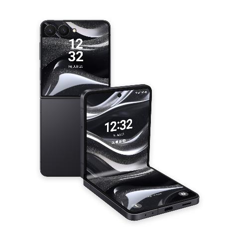 Two Samsung Galaxy Z Flip phones displaying a black wave glitter wallpaper, one folded upright and one standing behind it.