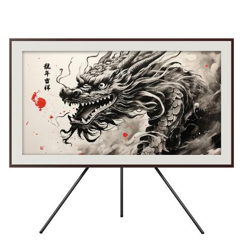 A framed rectangular digital screen displaying a Chinese ink painting of a fierce black and white dragon head emerging from dark clouds, with red ink splatters and black calligraphy on a white background. The screen is on a black tripod stand.