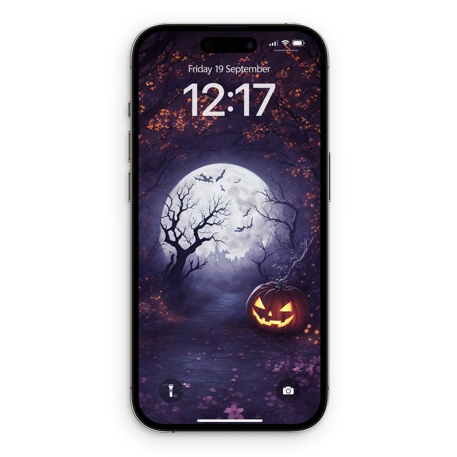 iPhone lock screen mockup displaying artwork of a glowing jack-o'-lantern on a cobblestone path beneath a full moon, gnarled tree, bats, and violet forest canopy.