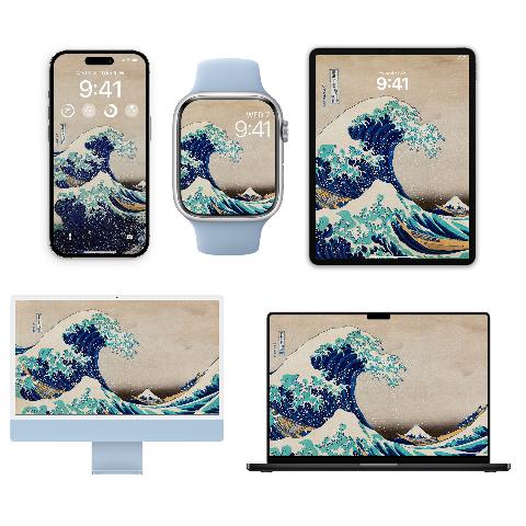A silver iPhone, an Apple Watch with a light blue band, a black iPad, a light blue iMac, and a black MacBook Pro, all displaying a digital wallpaper of Hokusai's The Great Wave Off Kanagawa.