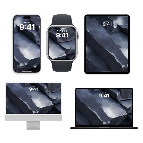 Five Apple devices including an iPhone, Apple Watch, iPad, iMac, and MacBook displaying matching wallpapers of chiseled blue titanium slabs.