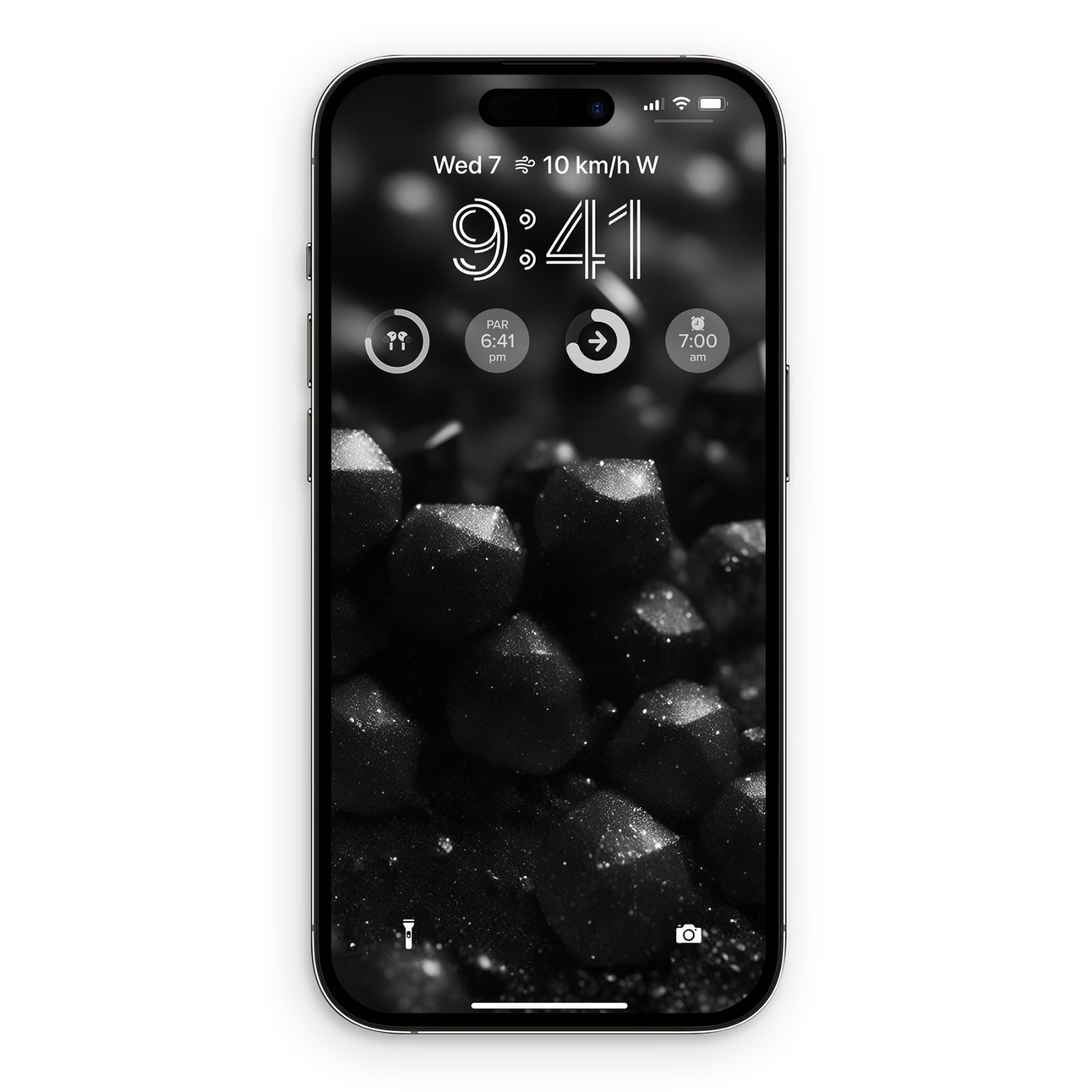 An iPhone screen mockup displaying a dark, moody wallpaper filled with geometric metallic glitter shapes and white light particles against a black backdrop.